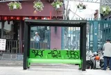 Trạm xe buýt mới tinh tại TP.HCM bị vấy bẩn bởi nạn vẽ bậy