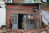 Người dân tháo dỡ nhà, giao mặt bằng làm cầu đường 6.300 tỷ ở TP.HCM