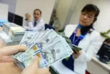 VND lội ngược dòng, tăng giá 1% so với USD