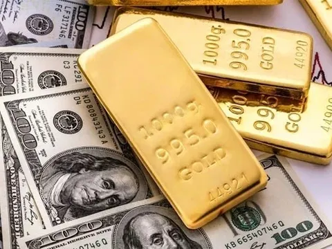Giá vàng và USD đồng loạt hạ nhiệt